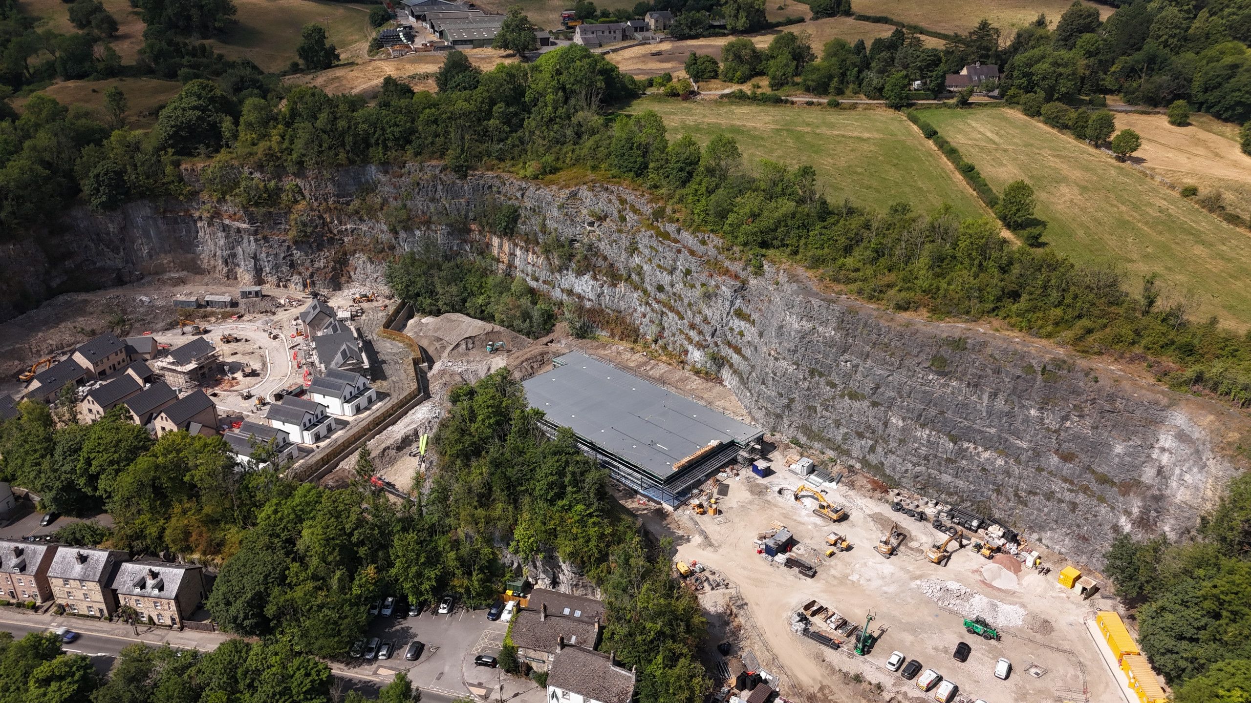 Aerial view of a limestone quarry and countryside near Matlock, Derbyshire